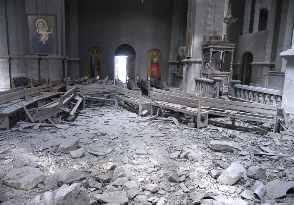 Destroyed pews and rubble in Azerbaijan cathedral