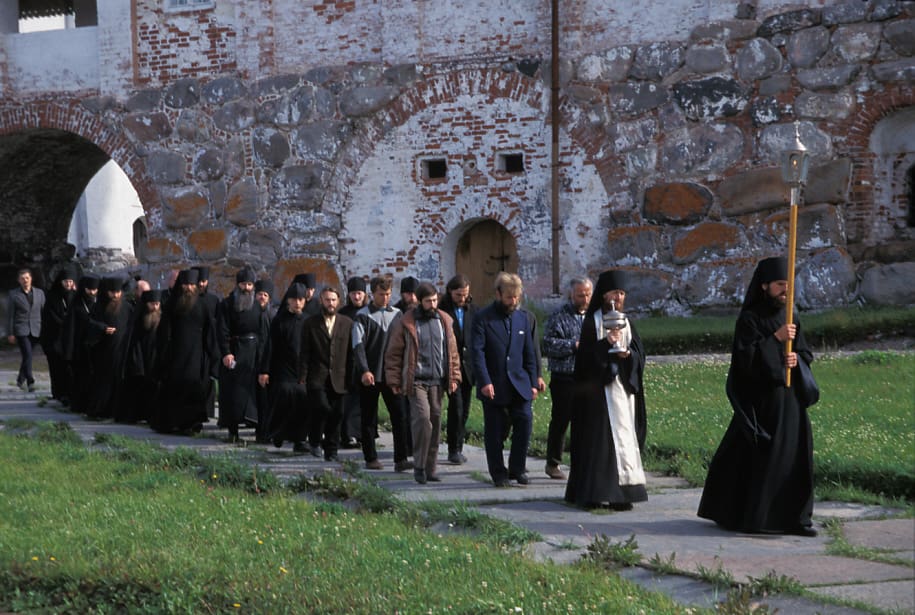 Russian Orthodox monks process on the grounds of the historic Solovetsky Monastery in Russia. (photo: George Martin)