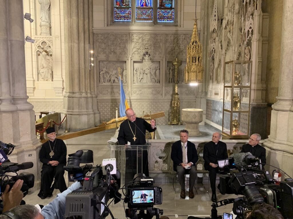 Cardinal Timothy Dolan speaks with journalists at a press conference on the situation in Ukraine at St. Patrick's Cathedral in New York on 24 March. Joining him, from left to right, are Metropolitan Borys Gudziak of the Ukrainian Greek Catholic Archeparchy of Philadelphia, Serhiy Kyslytsya, the Ukrainian ambassador to the United Nations, Archbishop Gabriele Caccia, permanent observer of the Vatican to the United Nations, and CNEWA President Msgr. Peter Vaccari.