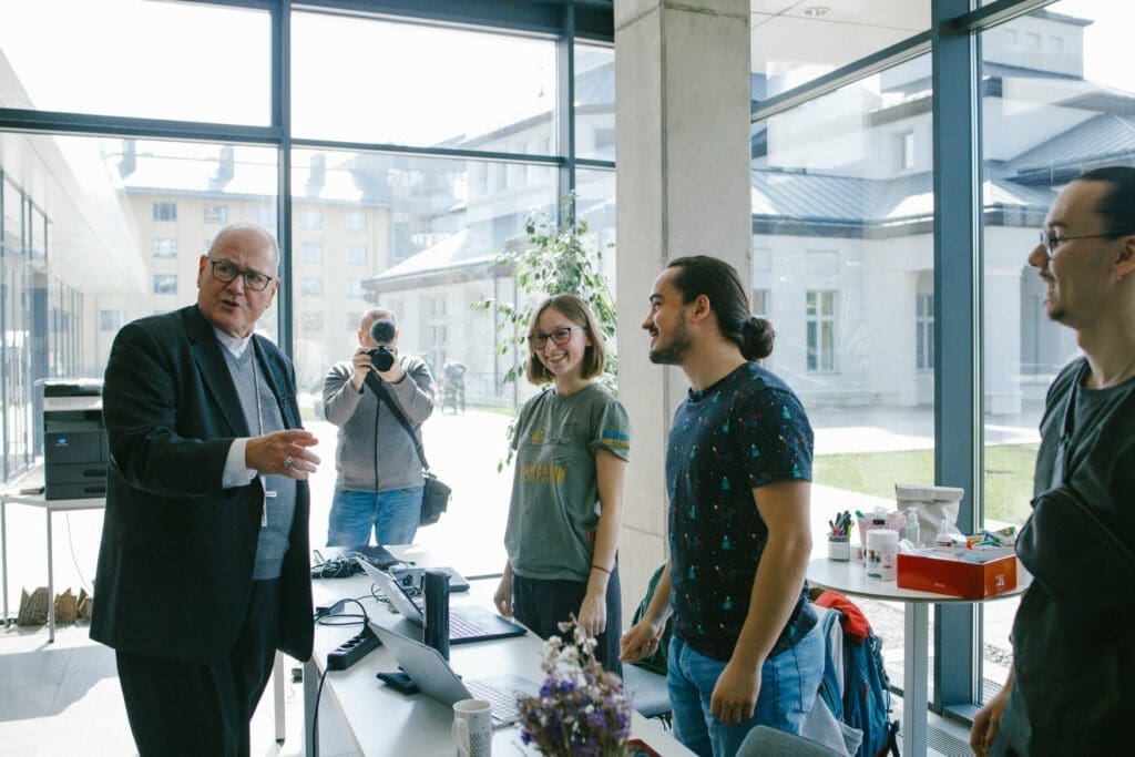 Cardinal Timothy Dolan meets with students at Ukrainian Catholic University in Lviv on 1 May.