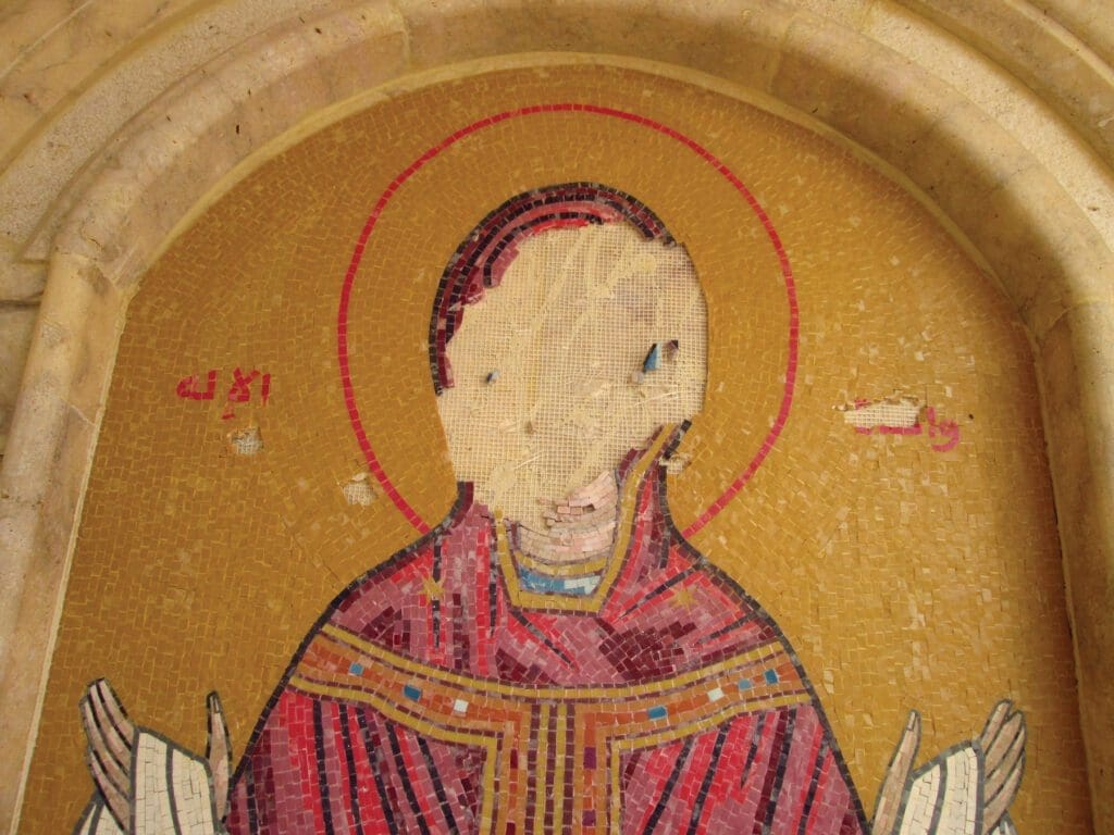An icon of Mary in a Melkite Greek Catholic church in Yabroud, Syria, was defaced by extremist rebels.