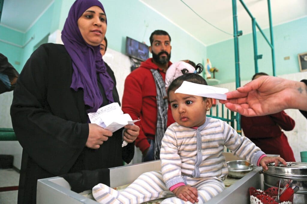 Parents are given a prescription for their child at the Klot Beik Dispensary.