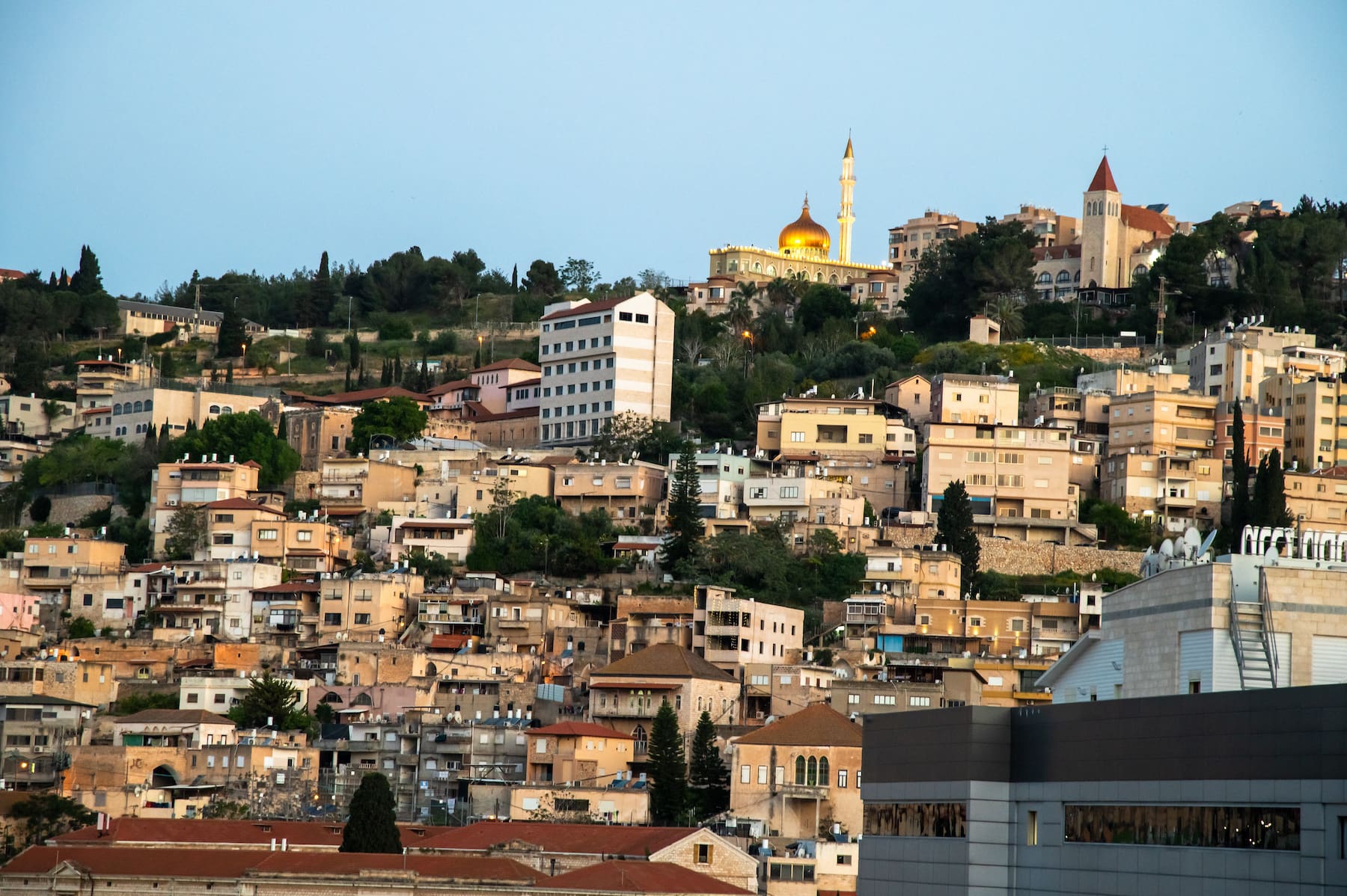 An outdoor photo of the city of Nazareth in Israel, showing buildings.