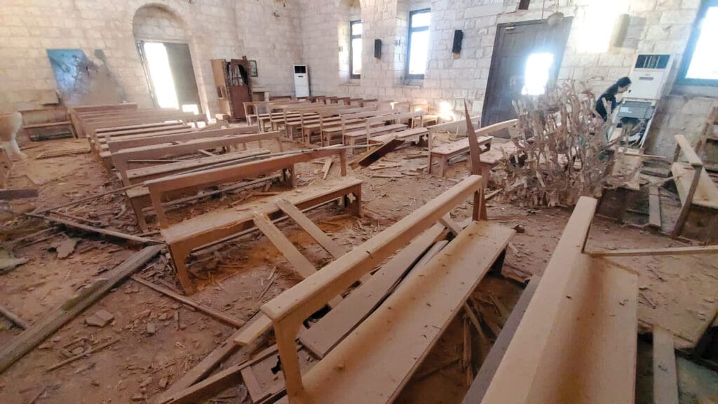 Inside of a church damaged by Israeli shelling.